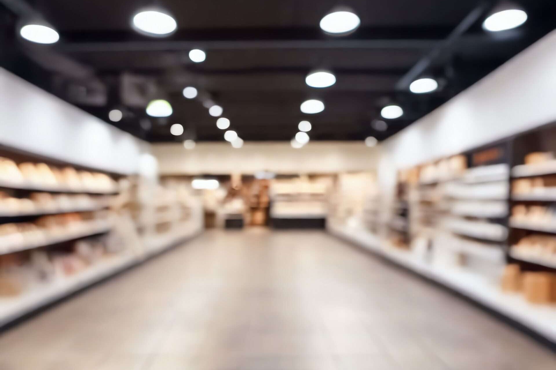 Blurred empty open space of store Abstract light bokeh on background of store interior for design