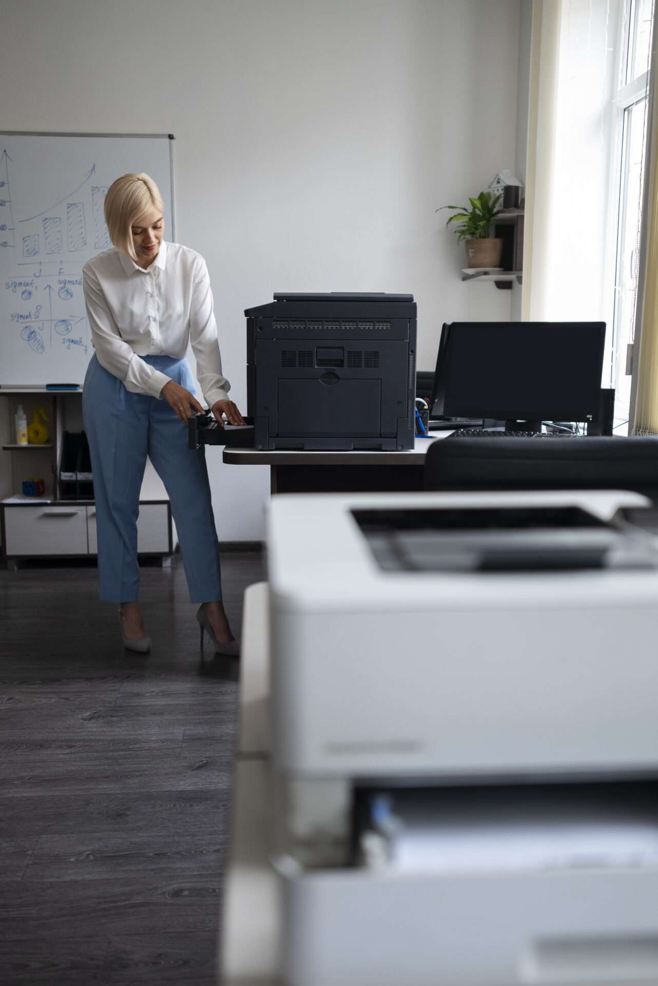 woman work office using printer